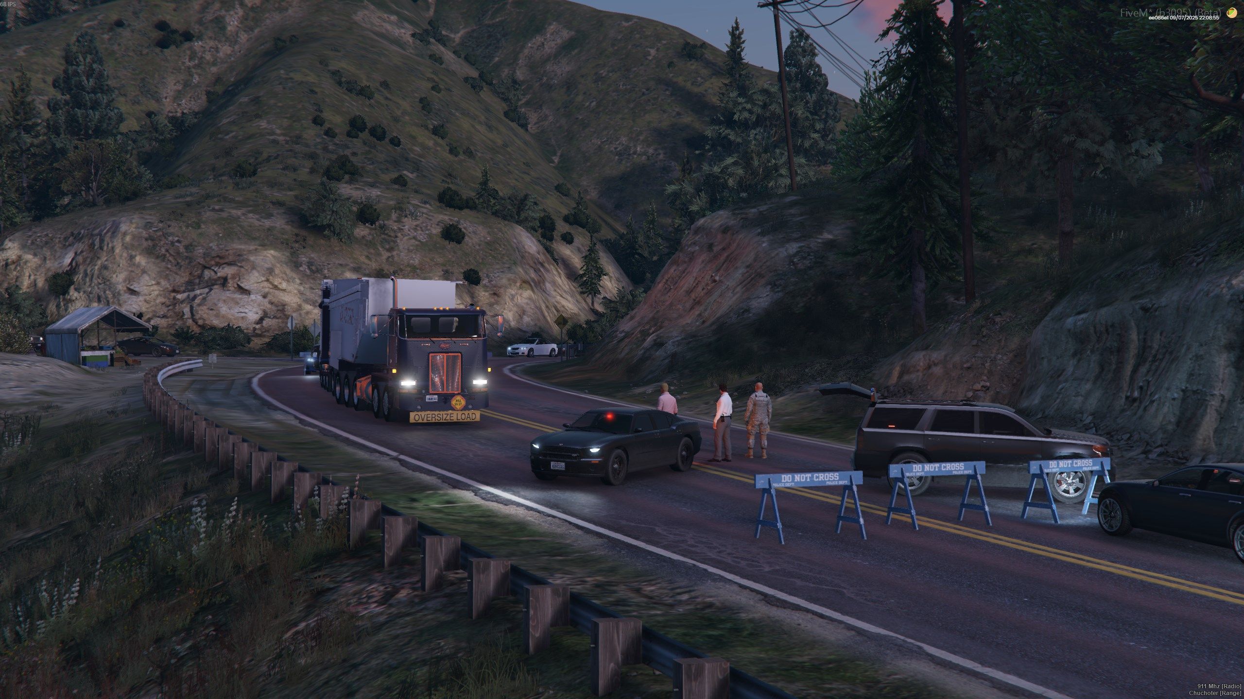 Escorted convoy at a road checkpoint