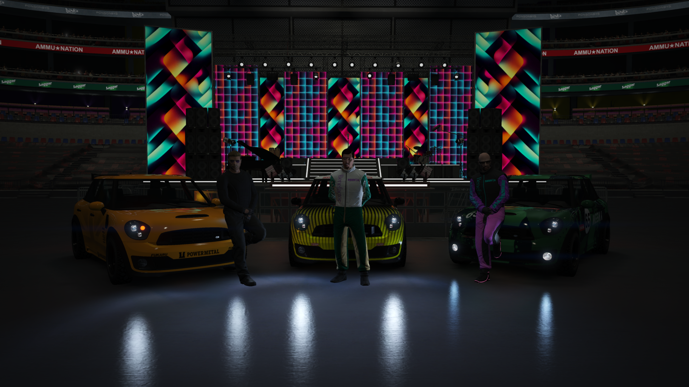 Rally cars and drivers at the finish, in the Maze Bank Arena